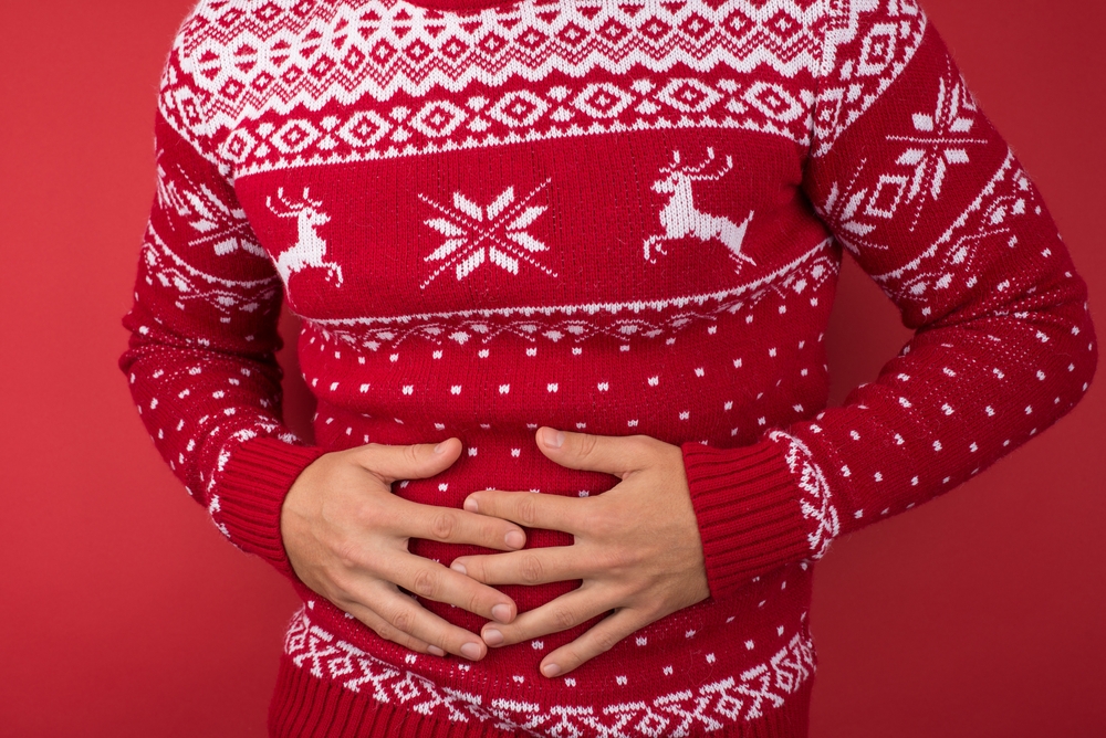 Pacjenci z niestrawnością w aptece (fot. Shutterstock).